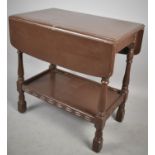 A Drop Leaf Two Tier Trolley, Casters Removed, 67cm wide