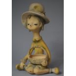 A Seto Craft (Noritake) Study of Seated Whistling Girl with Basket , 31cm high