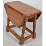 A Small Twist Top Drop Leaf Occasional Table, 52cm wide