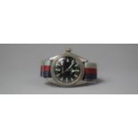 A Vintage Adora Blackface Wristwatch with Tricolour Strap, Swiss Movement