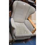 An Upholstered Wing Armchair