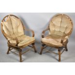 A Pair of Mid 20th Century Oak Framed Spindled Back Sprung Rocking Chairs