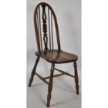 A Mid 20th Century Elm Seated Hooped Back Side Chair with Pierced Splat