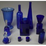A Collection of Eleven Pieces of Blue Glass to Comprise Moulded Reeded Vase, Two Poison Bottles,