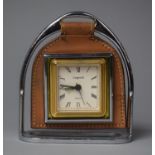 A Novelty Quartz Alarm Clock in the Form of a Stirrup, 14cm high