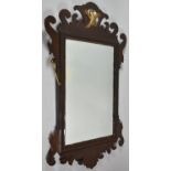 A 19th Century Mahogany Copy of a Georgian Fret Cut Wall Mirror with Gilt Ho-ho Bird, 70cm high