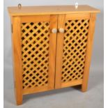 A Modern Pine Side Cabinet with Lattice Doors to Shelved Interior, 67cm Wide