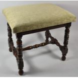 An Edwardian Oak Framed Rectangular Upholstered Stool with Turned Supports and Stretchers, 45cm Long