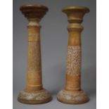 A Pair of Turned and Carved Wooden Candle Prickets, 33cm high