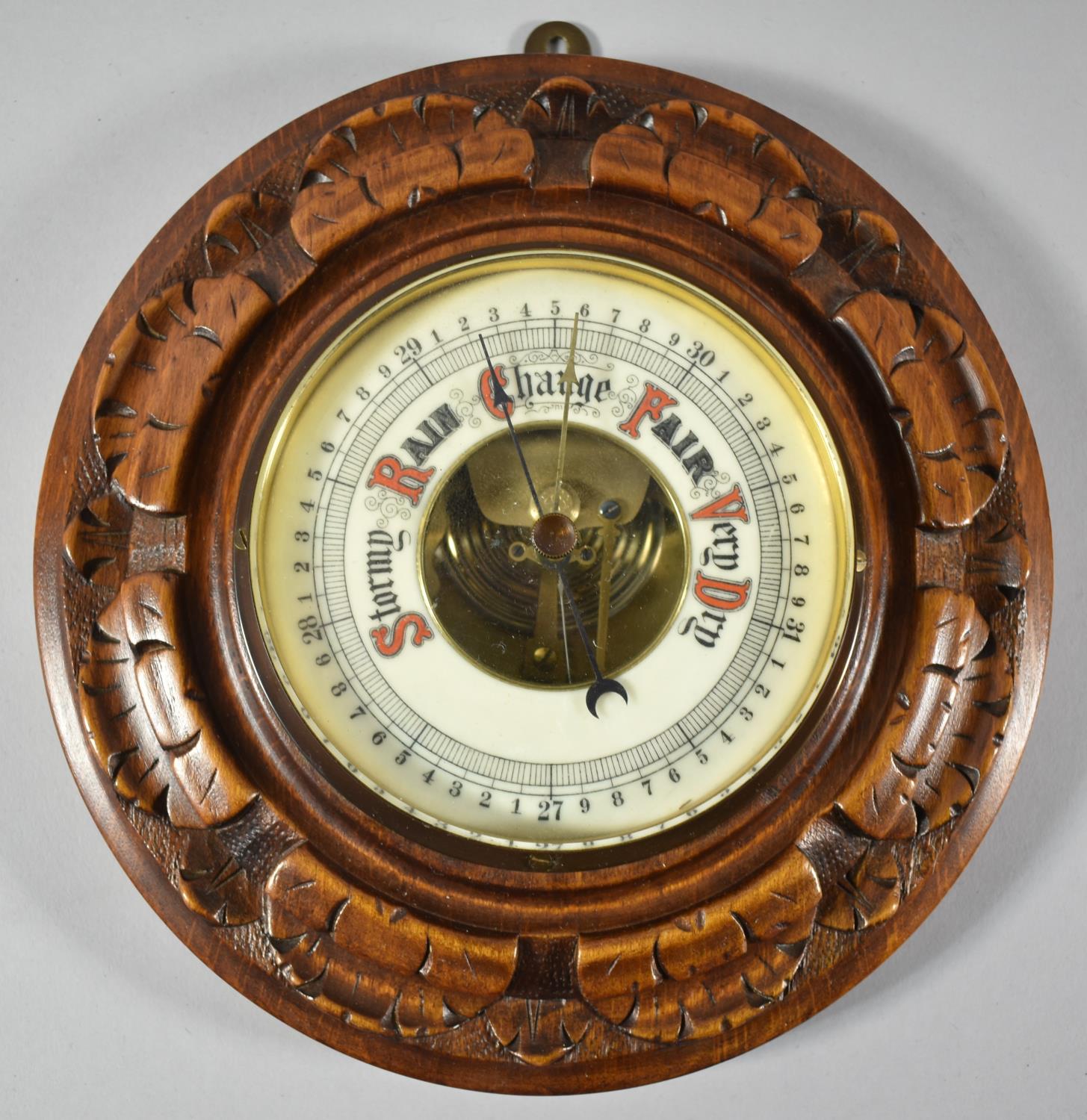 An Edwardian Wall Hanging Circular Carved Oak Aneroid Barometer, 21cm Diameter