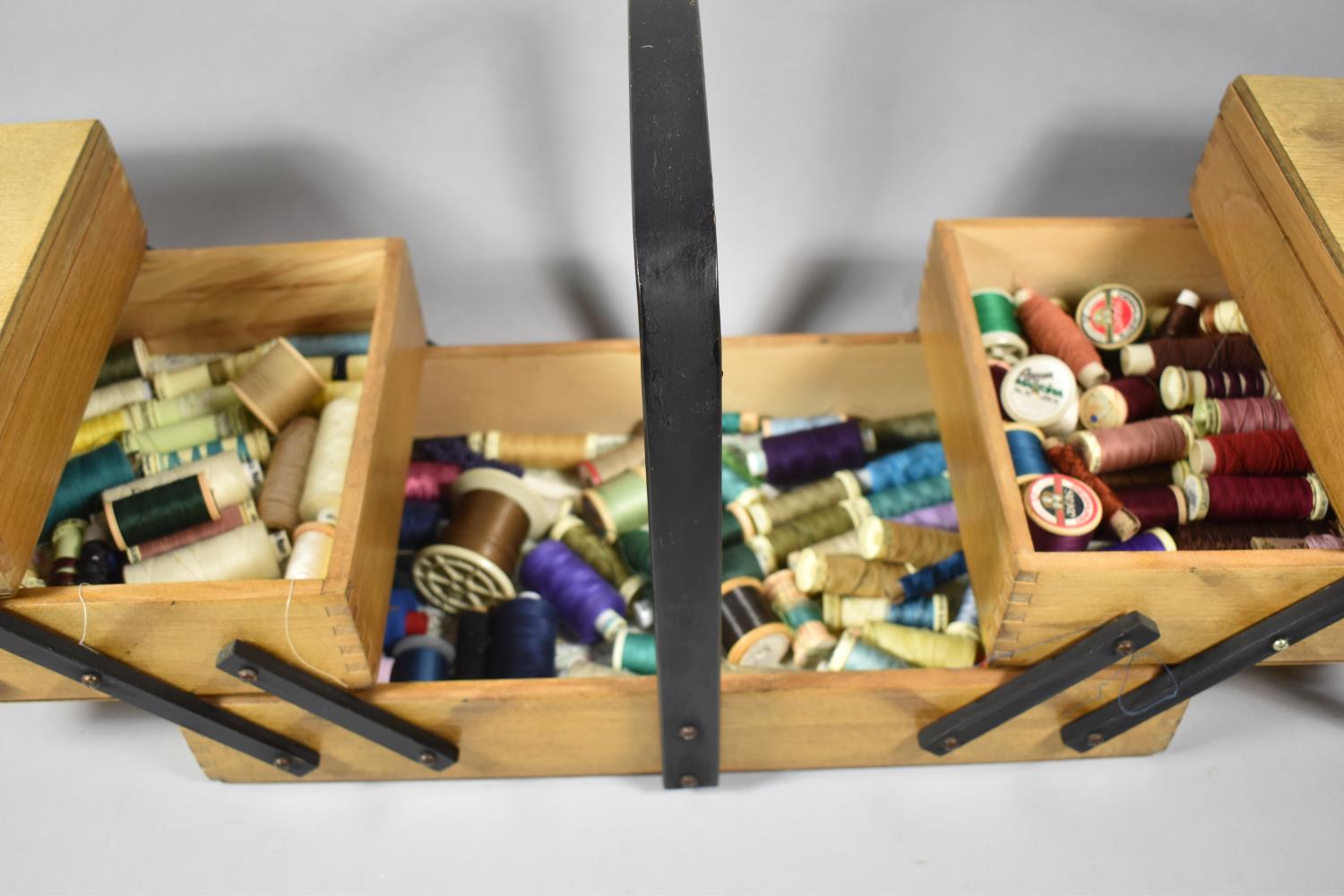 A Mid 20th Century Cantilevered Sewing Box Containing Various Cottons and Threads etc, In need of - Image 2 of 2