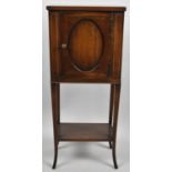 A Pretty Edwardian Inlaid Cabinet with Base Shelf, on Splayed Square Tapering Supports, 30cm wide