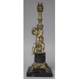 A French Ormolu and Marble Table Lamp, the Foot in the Form of a Seated Cherub with Grapes, 37.5cm