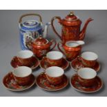 A Mid 20th Century Japanese Coffee Set with Applied Enamels on Red Ground Together with a Japanese