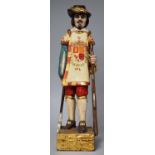 A Continental Carved Wooden Figure of Musketeer, 49cm High