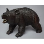 A Late 19th Century Carved Wooden Study of a Bear with Ivory Eyes and Teeth, 20cm long