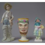 A Continental Surprise Mask Head Cup Together with a Lladro Figure of a Fishing Boy (No Rod) and