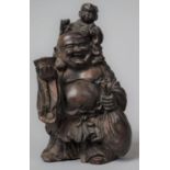 An Oriental Resin Study of Buddha and Child, 15cm high