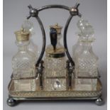 An Edwardian Six Bottle Cruet on Silver Plated Stand, Four Ball Feet, 20cm Wide