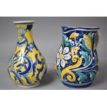 A Continental Majolica Glazed Vase and Similar Jug, 21cm high