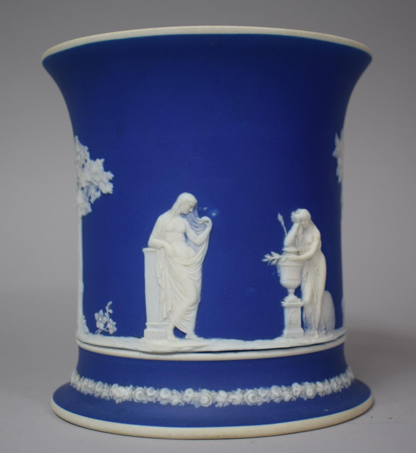 A Jasperware Cylindrical Blue and White Vase, 16cm high