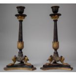 A Pair of Continental Cast Metal Bronze Effect Candle Sticks in the Second Empire Style on Triform