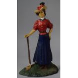 A Modern Cast Metal Doorstop in the Form of Edwardian Lady Golfer, 22cm high