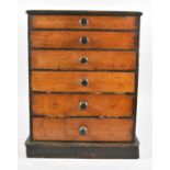 A 19th Century Collectors Cabinet of Six Graduated Drawers all With Wooden Handles Containing
