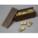 A Wooden Cased Set of Six Spot Dominoes, Each 3.5cm Long