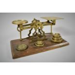 A Set of Brass Postage Scales and Weights on Wooden Plinth Base, 22.5cm long