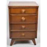 A Mid 20th Century Four Drawer Oak Chest with Turned Wooden Handles