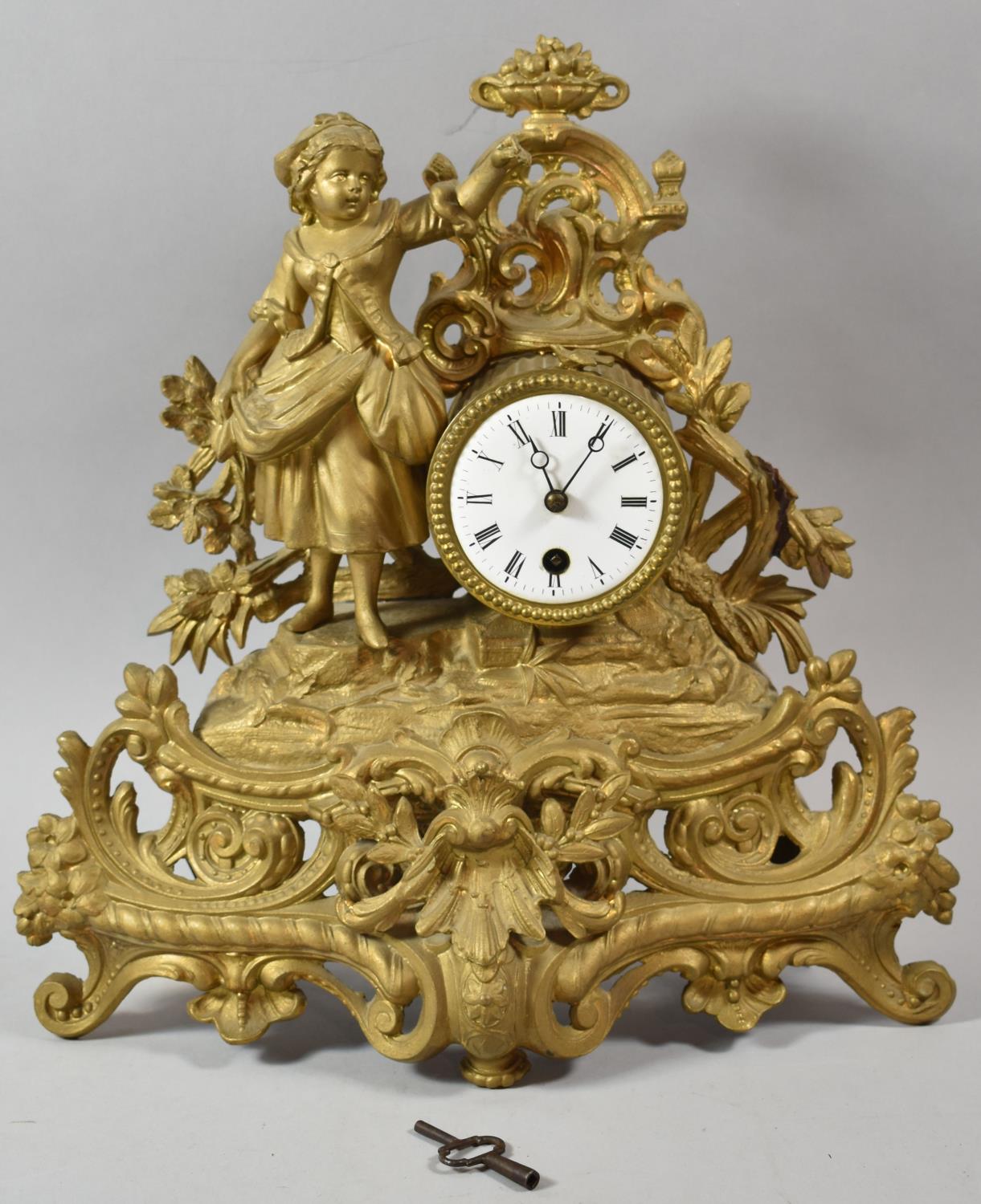 A French Gilt Metal Figural Mantle Clock with Barrel Movement, Has been Glued and Repaired, Movement