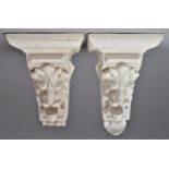 A Pair of Moulded Plaster Wall Hanging Lion Mask Shelf Sconces, 26cm high, One with Loss to Base