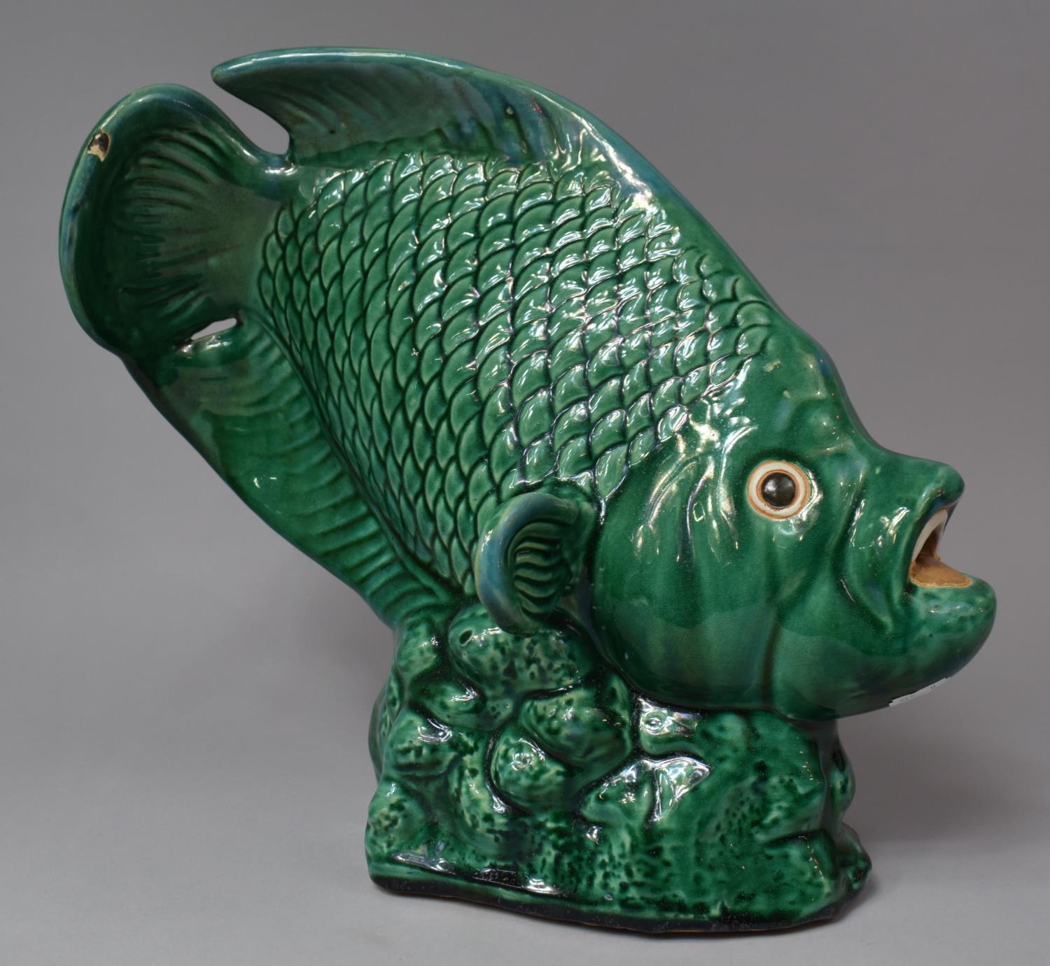 A Large Green Glazed Study of a Fish, Some Chips, 36cm high