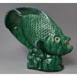 A Large Green Glazed Study of a Fish, Some Chips, 36cm high