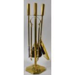 A Mid 20th Century Brass Fire Companion Set, 48cm high