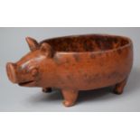 A Glazed Terracotta Novelty Bowl in the Form of a Pig, 29cm Long