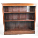 An Edwardian Mahogany Two Shelf Open Bookcase On Plinth Base, 121cm wide
