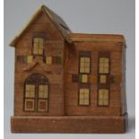 A Vintage Novelty Treen Puzzle Money Box In the Form of a Townhouse, 12cm wide