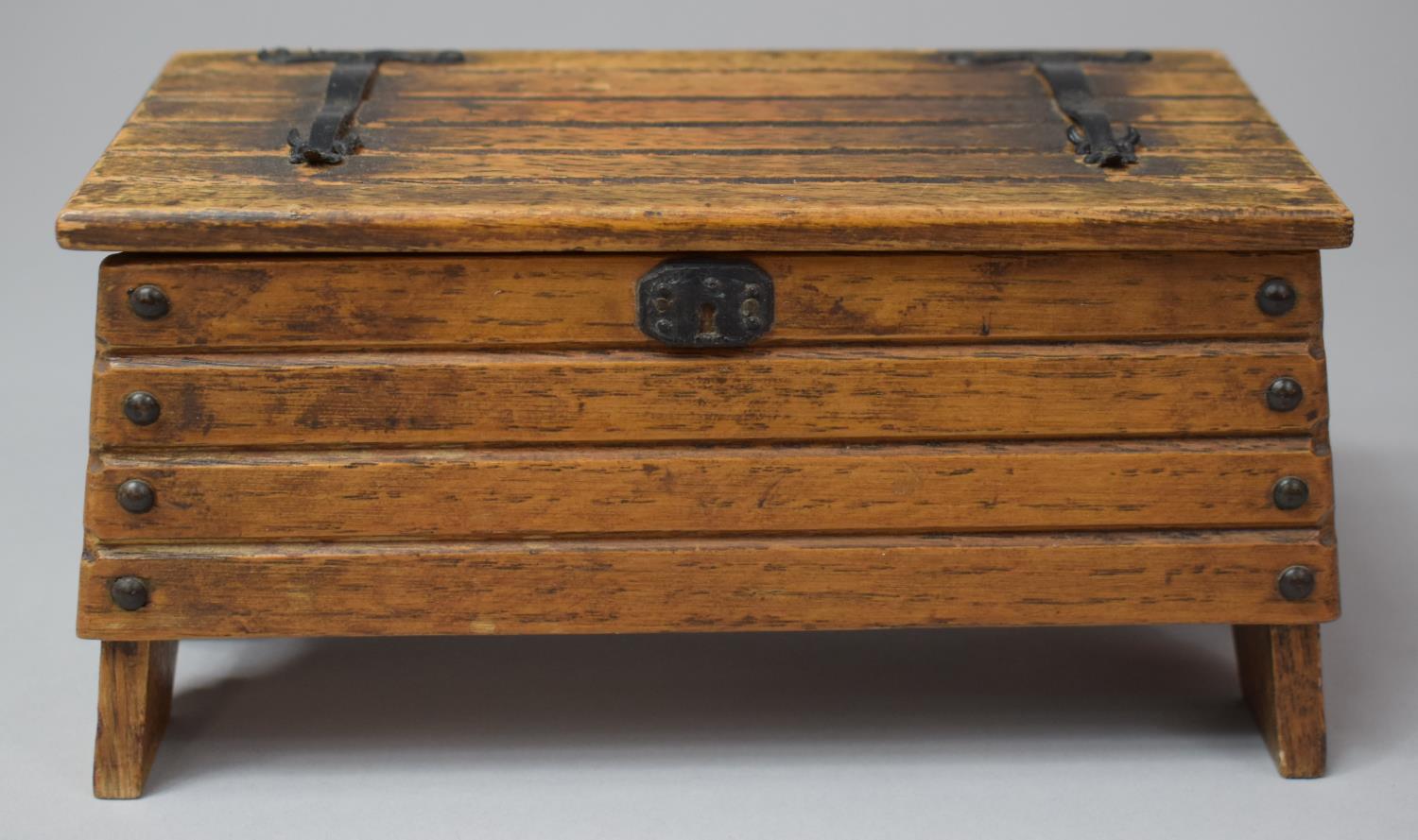 A Novelty Musical Box In the Form of an Iron Mounted Lift Top Coffer Chest by Tallent of Old Bond