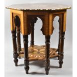 A Highly Varnished Inlaid Octagonal Topped Table with Stretcher Shelf and Turned Supports, 51cm