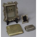 A Silver Plated Photo Frame, Cigarette Case, Snuff Box and a Miniature Frame