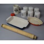 A Collection of Kitchen Wares to Include Six Ceramic Cheese Containers, Wooden Rolling Pin, Le