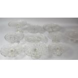 A Collection of Ten Moulded Glass Cake Stands, Various Sizes
