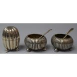 A Pair of Victorian Silver Salts of Circular Ribbed Form with Ball Feet Complete with Spoons