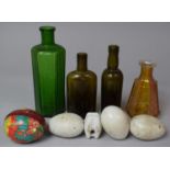 A Collection of Coloured Glass Bottles, Ceramic Eggs etc