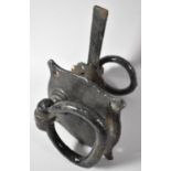 A Wrought and Cast Iron Door Latch Fitting with Ring Handles