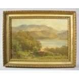 A Gilt Framed Oil on Canvas Depicting Shepherd with Sheep Beside Lake, Signed H Cheadle, (1852-