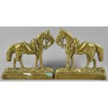 A Pair of Late 19th Century Moulded Brass Fireside Ornaments or Doorstops in the Form of War Horses,