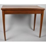 A Modern String Inlaid Lift Top Tea Table on Square Tapering Supports, 91cm wide